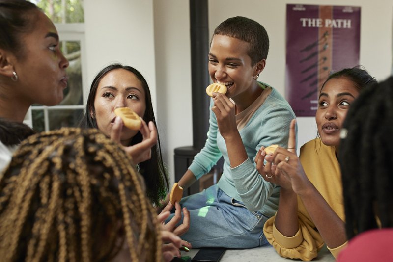 A family together snacking on food